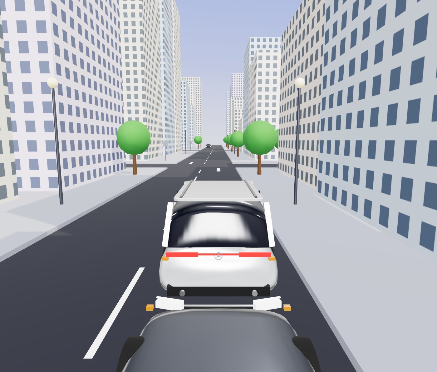 3D-Fahrstunde in Lappen City: Blick über die Motorhaube auf Straße, Verkehr und Häuser